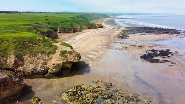 Cliffs and beach at Blackhall Rocks and Cromdon Dene Beach