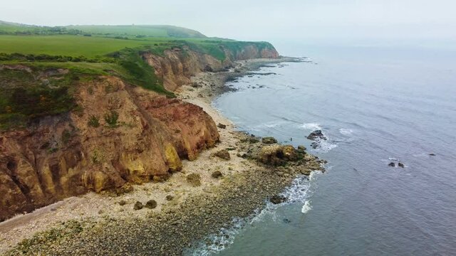 Cliffs and beach at Blackhall Rocks and Cromdon Dene Beach