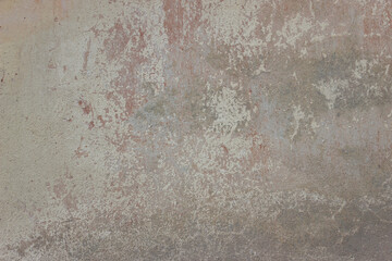 Beautiful old gray-brown concrete wall with crumbled cement 