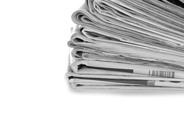 pile of newspaper with white background stock photo