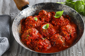 Appetizing meatballs with tomato sauce