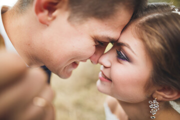 Close up of a nice young wedding couple