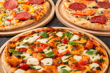 Three types of Italian pizza from above. Close-up.