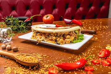 Delicious Pizza Classic Homemade Tomato Sauce Sausage Cheese Onion Meat Pasta Shrimp Restaurant Menu Gourmet on a wooden table