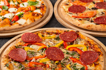 Three types of Italian pizza from above. Close-up.