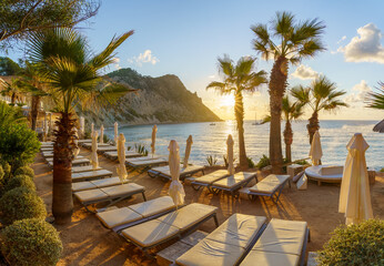 Fototapeta na wymiar Landscape with Sol d'en Serra beach at sunrise time, Ibiza islands, Spain