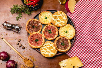 Delicious Pizza Classic Homemade Tomato Sauce Sausage Cheese Onion Meat Pasta Shrimp Restaurant Menu Gourmet on a wooden table