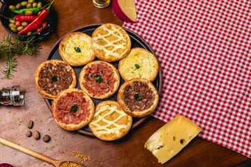 Delicious Pizza Classic Homemade Tomato Sauce Sausage Cheese Onion Meat Pasta Shrimp Restaurant Menu Gourmet on a wooden table