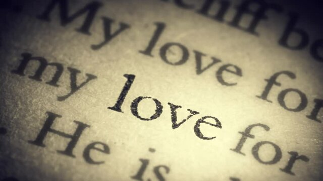 The words Truth, love, happiness and believe, replacing each other on the old page in the book, are separated from the general text and approach the camera. Creative 3D 4k slow motion loop animation.
