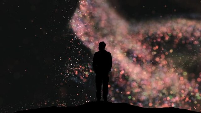 The man stands on a flying cosmic particles background. slow motion