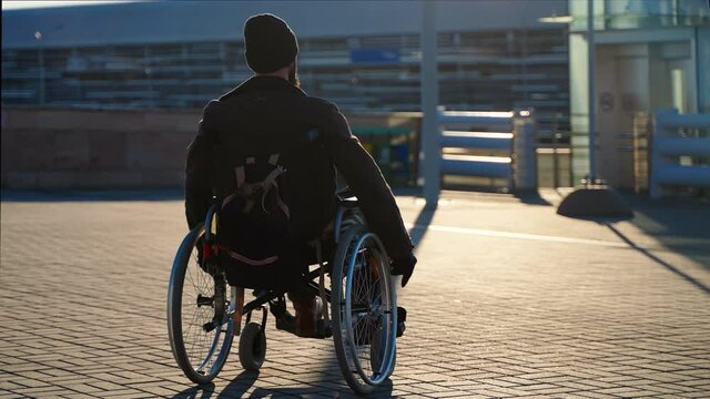 Disabled man outdoor in sunny morning