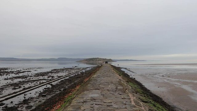 Walk through Cramond Causeway towards Cramond Island. Edinburgh, Scotland, United Kingdom