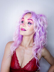 Fototapeta premium Girl with bright makeup and purple hair