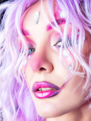 Girl with bright makeup and purple hair