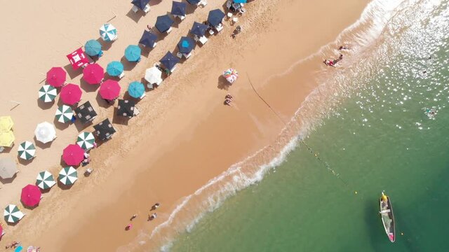 Beautiful view of the beach, aerial view of the beach, acapulco beach seen from above. Travel and vacation concept. Colorful sunset on the beach. Aerial video