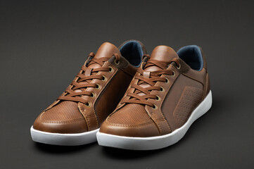 men's stylish shoes on a dark background. 