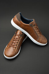 men's stylish shoes on a dark background. 