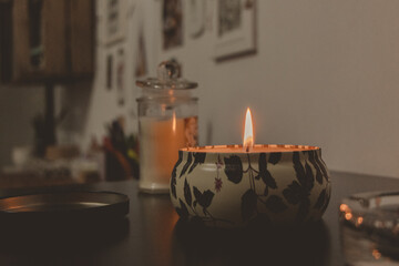 lighted candle in bedroom