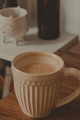 cup of latte in the table