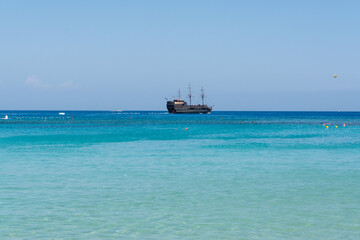 Crystal clear blue water of Mediterranean sea on Fig tree beach in Protaras, Cyprus