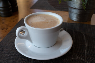 White cup of italian coffee cappuccino