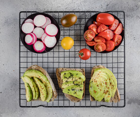 avocado toast with fresh vegetables  