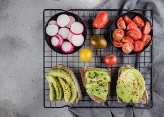  avocado toast with fresh vegetables  