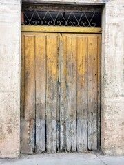 old door in grey and yellow colours 