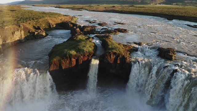 Godafoss extreme waterfall from aerial view at sunset in 4k