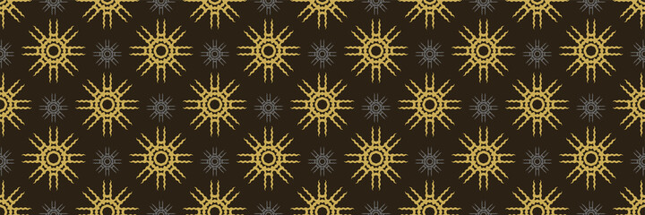 Beautiful background pattern decorative ornaments in the form of gold stars on a black background for your design. Seamless background for wallpaper, textures.