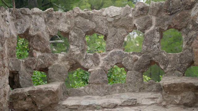Stone Bench In Park Guell, Designed By Antoni Gaudi, In Barcelona, Spain. close up, slider shot 4k