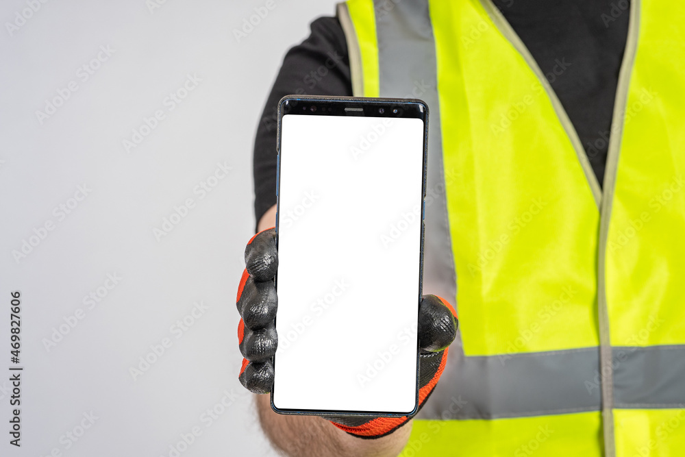 Poster phone builder. smartphone builder blank screen. man holds out phone to camera. place for text on scr