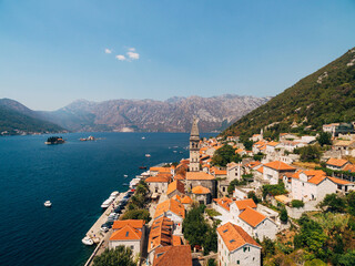 Naklejka na ściany i meble Drone view of the red roofs of ancient Perast houses. Montenegro