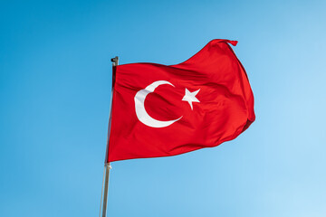 Turkish flag - Turkey Republic national flag waving with the wind in the sky.	