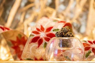 Holiday cannabis with red poinsettias