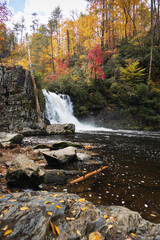 Abrams Falls with fall foliage background in Great Smoky Mountains National Park, Tennessee