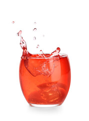 Glass of classic negroni cocktail with splashes on white background