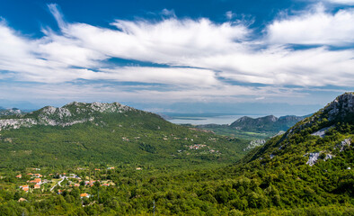 Montenegro landscape view looking towards Skadar Lake from a mountain road.