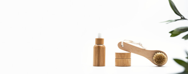 Bath bamboo brush, eco-friendly bamboo bottle and jar. Set of natural cosmetic products. Zero waste. No plastic concept.