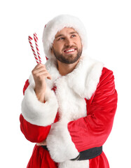 Santa Claus with candy canes on white background