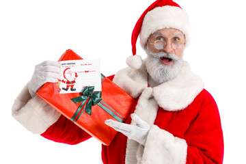 Surprised Santa Claus with greeting card and gift on white background