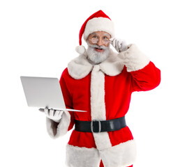 Santa Claus with modern laptop on white background