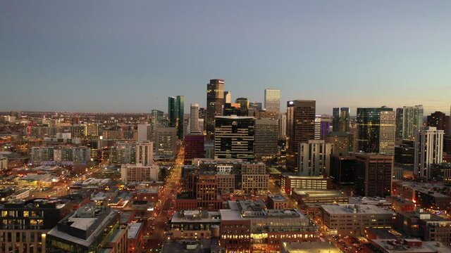A pan over the Denver skyline at sunset.