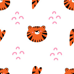 Seamless pattern of cute tiger head and hearts on white background. Nursery print design. Symbol of New Year 2022.