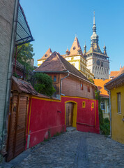 Image of view on Clock tower from streets in Sighisoara in Romania.