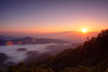 Fototapeta na wymiar Aerial view Beautiful of morning scenery sea of cloud and the fog flows on high mountains. Doi Montngo, Mae Taeng, Chiang Mai. THailand