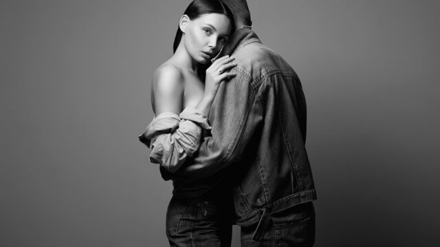 lovely beautiful couple in jeans. sexy woman with Man