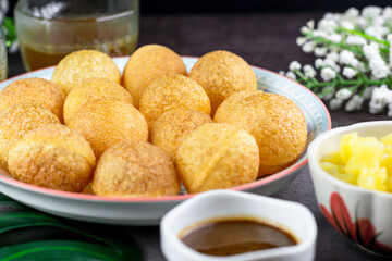 Indian traditional snack. Pani puri with boiled potato and sauce.