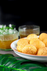 Indian traditional snack. Pani puri with boiled potato and sauce.