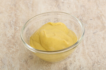 Organic mustard sauce in the bowl